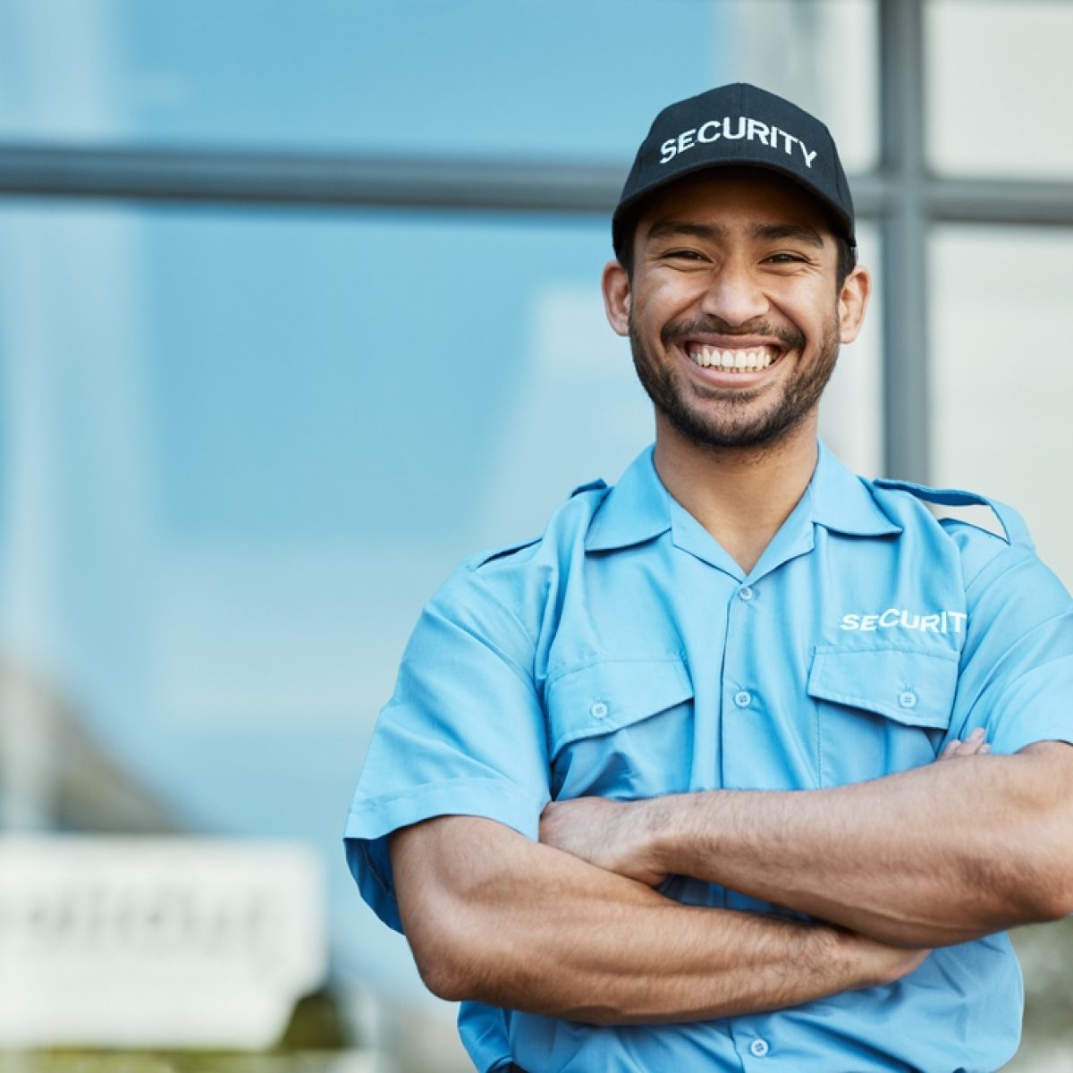 Happy,Man,,Portrait,And,Security,Guard,With,Arms,Crossed,In